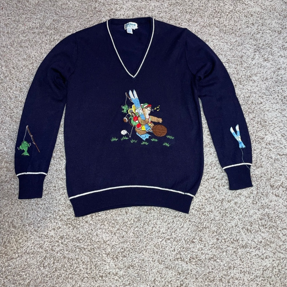 ades of California blue sweater with white trim and stitched design size Medium